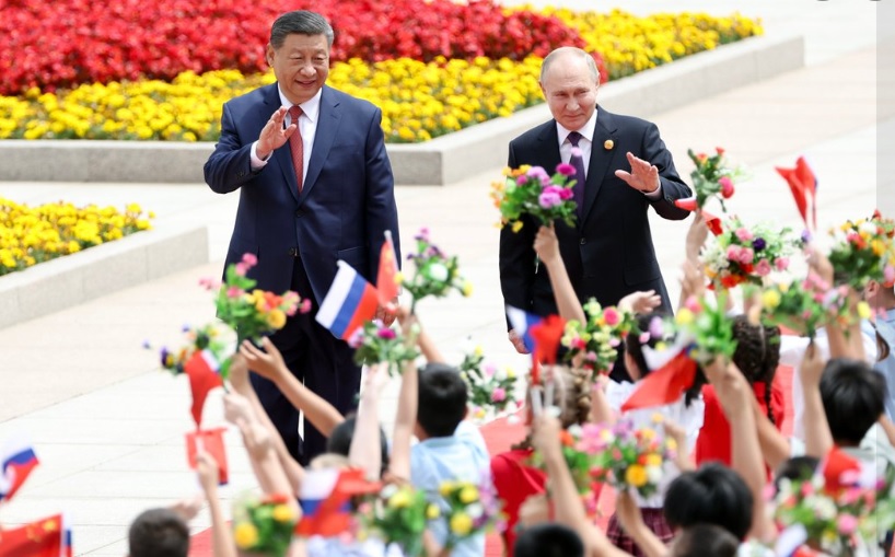 China-Russia-Pledge-to-Further-Deepen-Cooperation-Partnership-in-New-Era