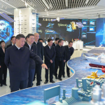 XI