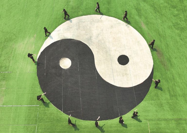 practitioners-performing-baguazhang-movements-at-a-public-event-in-Wenan-county