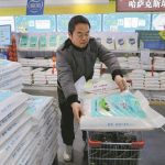 customer-purchases-a-bag-of-wheat-flour-from-Kazakhstan-